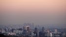 Century City and downtown Los Angeles are seen through the smog in this December 31, 2007 file photo. California is set to unveil a new weapon in its fight against global climate change November 14, 2012 when it holds its first sale of carbon emissions permits - a landmark experiment that it hopes will serve as a model for other U.S. states and the federal government. REUTERS/Lucy Nicholson/Files (UNITED STATES - Tags: ENVIRONMENT SOCIETY) Published: Lis. 14, 2012, 5:43 odp.