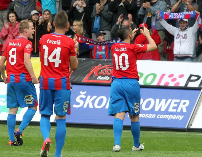 Fotbalisté Plzně David Limberský, Radim Řezník a Pavel Horváth v utkání se Spartou Praha v sedmém kole Gambrinus ligy 2012/13.