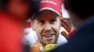 Ferrari F1 driver Sebastian Vettel speaks to media in the paddock.