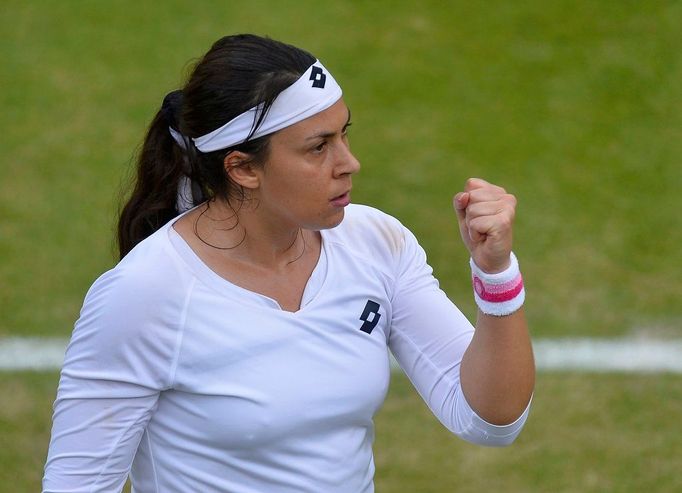 Marion Bartoliová na Wimbledonu 2013.