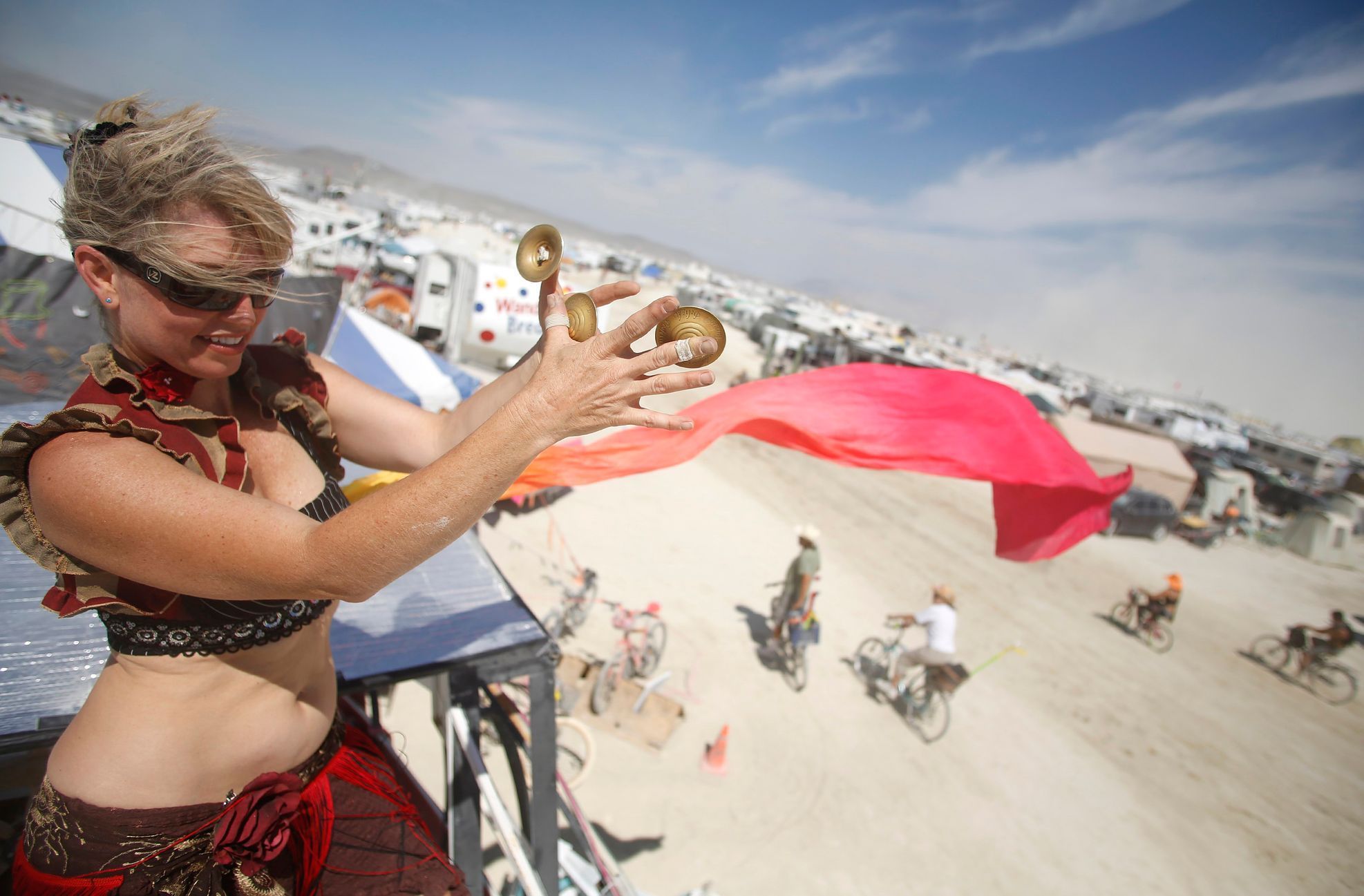 Paulina Carey dances during the Burning Man 2014 &quot;Caravansary&quot; arts and music festival in the Black Rock Desert of Nevada