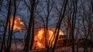 Ukrainian service members of the 4th Ivan Vyhovskyi Separate Tank Brigade fire a 2S1 Gvozdika self-propelled howitzer toward Russian troops near the front line town of Ku