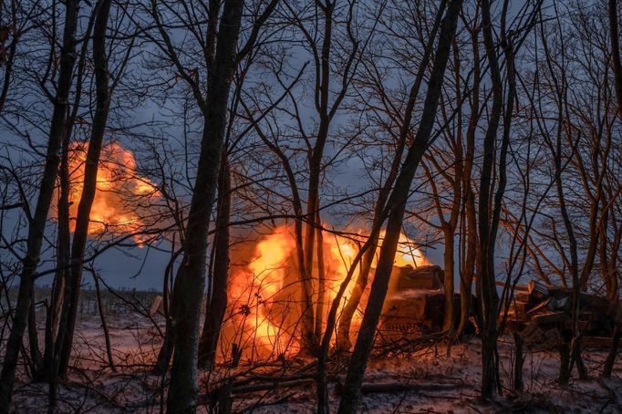 Ukrainian service members of the 4th Ivan Vyhovskyi Separate Tank Brigade fire a 2S1 Gvozdika self-propelled howitzer toward Russian troops near the front line town of Ku