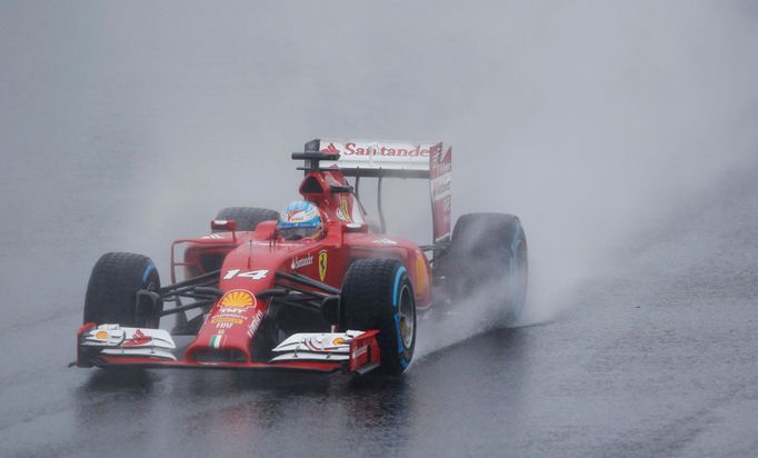 Ferrari Formula One driver Fernando Alonso of Spain drives during the Japanese F1 Grand Prix at the Suzuka Circuit October 5, 2014. REUTERS/Toru Hanai (JAPAN - Tags: SPOR