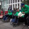 People line up outside the Apple Store in advance of an Apple special event, in the Manhattan borough of New York