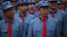 Mid-level government officials dressed in red army uniforms listen to a lesson as they visit an old house where former Chinese leader Mao Zedong used to live, during a five-day training course at the communist party school called China Executive Leadership Academy of Jinggangshan, in Jiangxi province, in this September 21, 2012 file photo. With China's economy slowing and public scrutiny of officials on the rise via social media, the party is likely to endorse deepening its training push when Hu passes the baton to new leaders at the 18th Party Congress, which is expected to be held as early as next month. China's cadre training system is run out of academies across the country, some focusing on practical aspects of 21st century communism such as handling the media and management skills, including role-play scenarios on how to manage a variety of crises from mass protests to train crashes. Picture taken September 21, 2012. REUTERS/Carlos Barria/Files (CHINA - Tags: POLITICS SOCIETY) Published: Zář. 25, 2012, 9 odp.