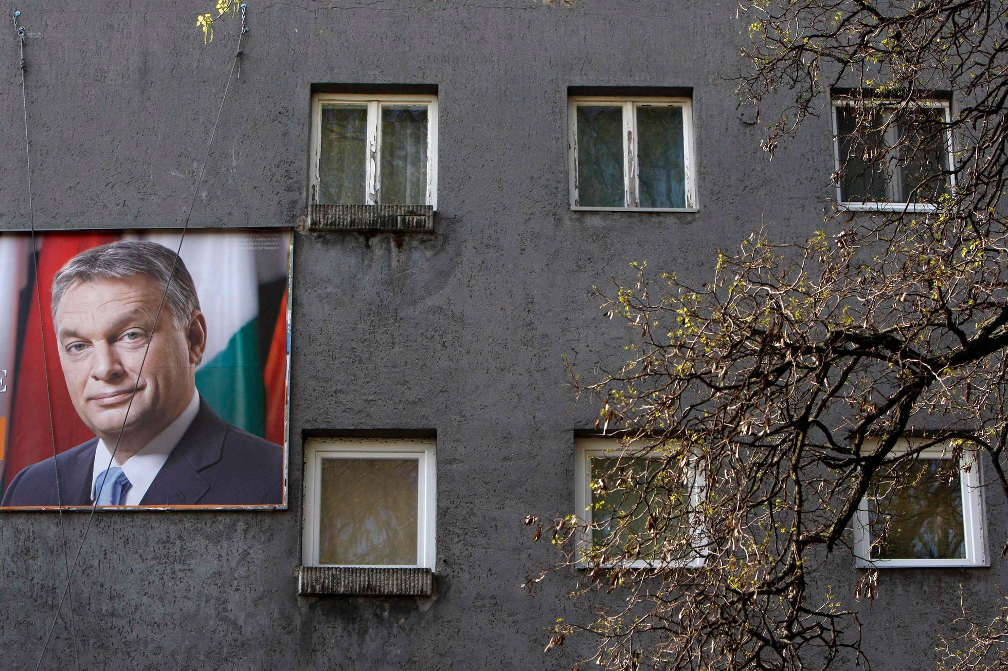 An election poster of Hungarian Prime Minister Orban is seen on a residential building in Budapest