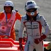 Marussia Formula One driver Bianchi of France walks away from his car during the Japanese F1 Grand Prix at the Suzuka circuit