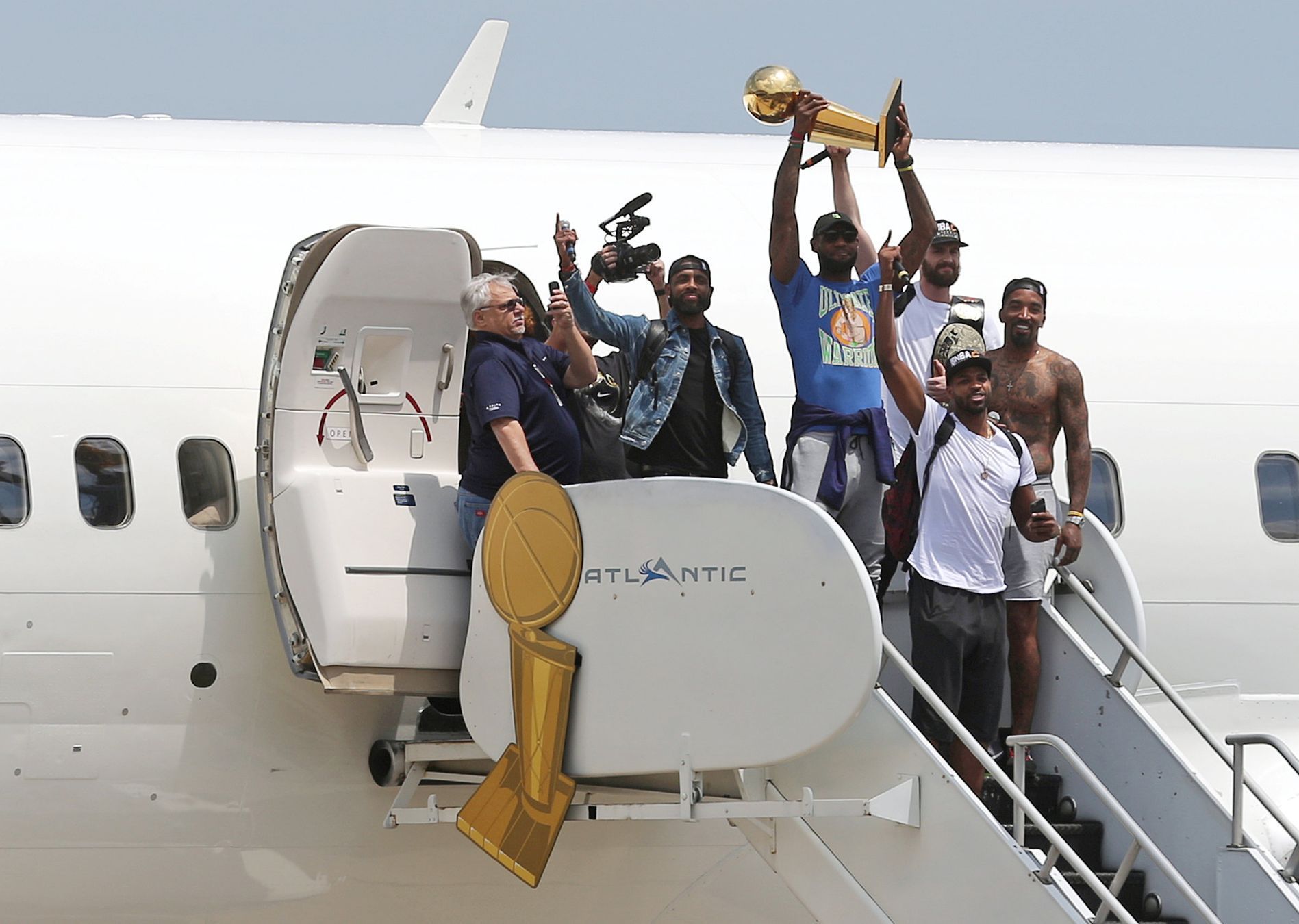 Cleveland Cavaliers Kyrie Irving, LeBron James, Kevin Love, JR Smith and Tristan Thompson arrive home to a welcome party in Cleveland