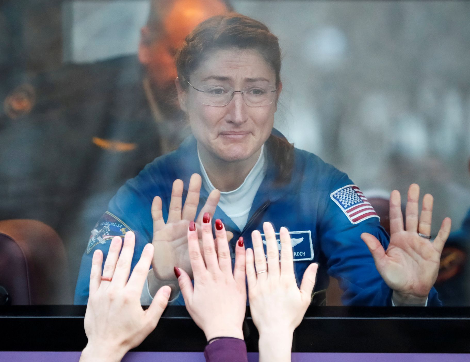 Americká astronautka Christina Kochová v roce 2019 před odletem na ISS.