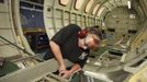 Cessna employee Katherine Johnson works on the line during a tour of the Cessna business jet assembly line at their manufacturing plant in Wichita, Kansas August 14, 2012. One of Cessna Aircraft Company CEO and president Scott Ernes' first moves after joining in May 2011 was to carve Cessna up into five units, each of which run by an executive who was responsible for whether the unit reported a profit or loss. Picture taken August 14, 2012. REUTERS/Jeff Tuttle (UNITED STATES - Tags: TRANSPORT BUSINESS) Published: Srp. 22, 2012, 11:41 dop.