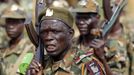 Soldiers of South Sudan's SPLA army shout at a military base in Bentiu