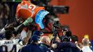 Feb 1, 2015; Glendale, AZ, USA; New England Patriots head coach Bill Belichick is dunked with Gatorade after defeating the Seattle Seahawks in Super Bowl XLIX at Universi