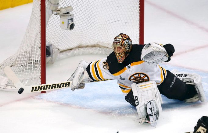 Boston Bruins goalie Tuukka Rask makes a save against the Chicago Blackhawks during the second period in Game 1 of their NHL Stanley Cup Finals hockey series in Chicago,