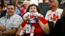 Convention-goers listen to speeches during the first day of the Democratic National Convention in Charlotte, North Carolina, September 4, 2012. REUTERS/Eric Thayer (UNITED STATES - Tags: POLITICS ELECTIONS) Published: Zář. 4, 2012, 10:53 odp.