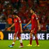 Spain's Koke, Cazorla and Busquets walk off the pitch at the end of their 2014 World Cup Group B soccer match against Chile in Rio de Janeiro