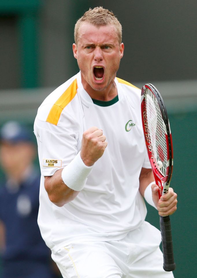 Lleyton Hewitt of Australia reacts during his men's singles tennis match against Stanislas Wawrinka of Switzerland at the Wimbledon Tennis Championships, in London June 2