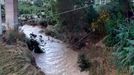 The swollen Milicia river runs in the area where nine people lost their lives when their home was flooded in Casteldaccia, near Palermo.