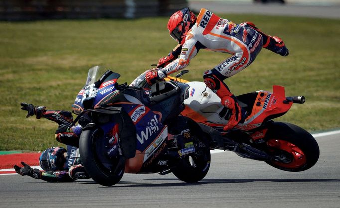 MotoGP - Portuguese Grand Prix - Algarve International Circuit, Portimao, Portugal - March 26, 2023 Repsol Honda Team's Marc Marquez and CryptoDATA RNF MotoGP Team's Migu