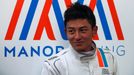 Manor Racing Formula One driver Rio Haryanto of Indonesia stands outside his team's garage after the third testing session ahead the upcoming season at the Circuit Barcel