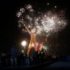 Fireworks are seen before the Man burns during the Burning Man 2014 &quot;Caravansary&quot; arts and music festival in the Black Rock Desert of Nevada