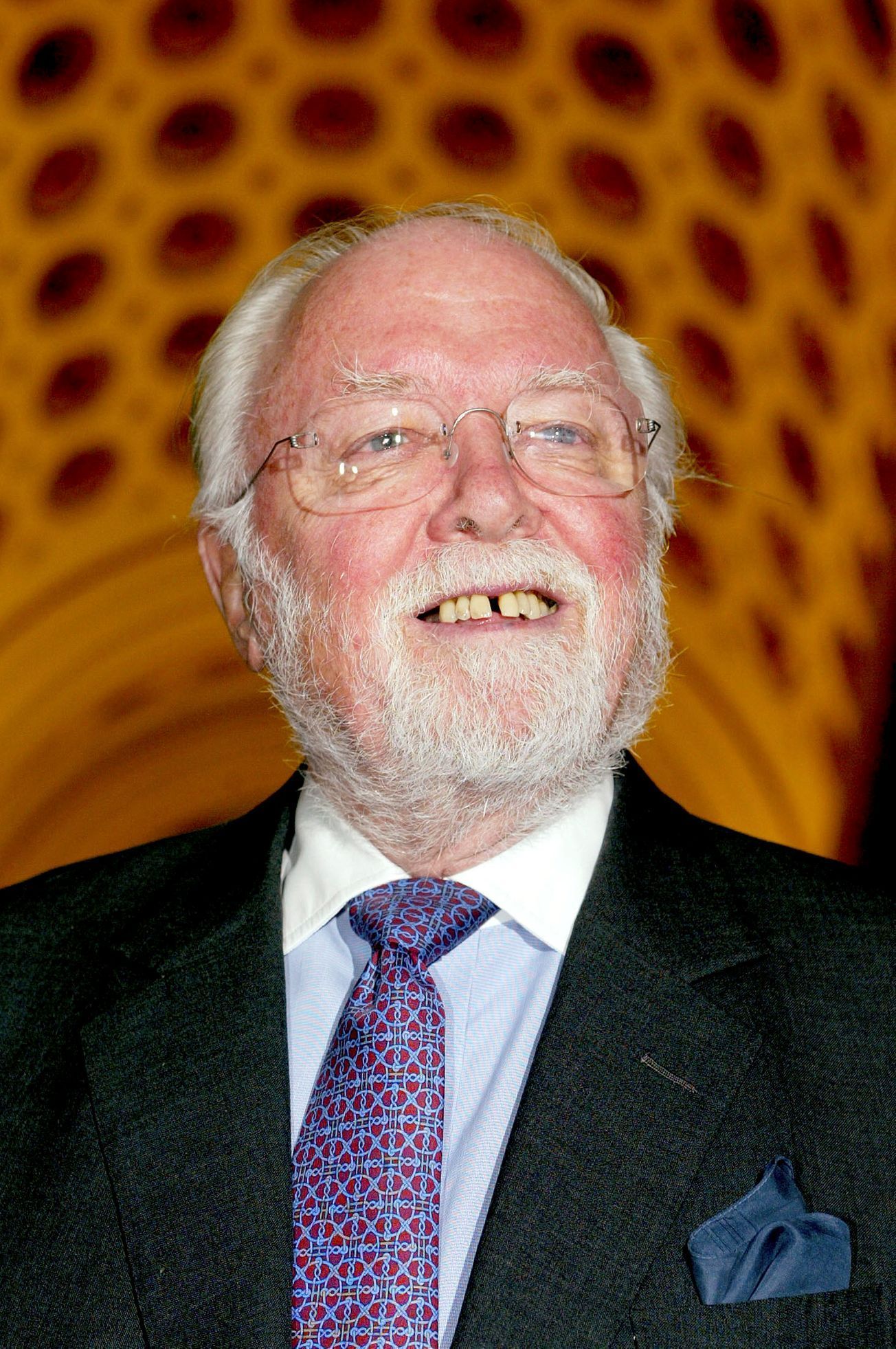 File picture shows British filmmaker Sir Richard Attenborough arriving at a reception hosted by Britain's Queen Elizabeth II at Buckingham Palace in London