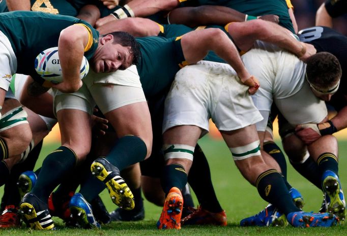 South Africa players compete in a scrum with New Zealand players during their Rugby World Cup Semi-Final match at Twickenham in London, Britain, October 24, 2015. REUTERS