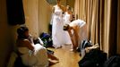 Dancers wait before the opening ceremony of the Opera Ball in Vienna