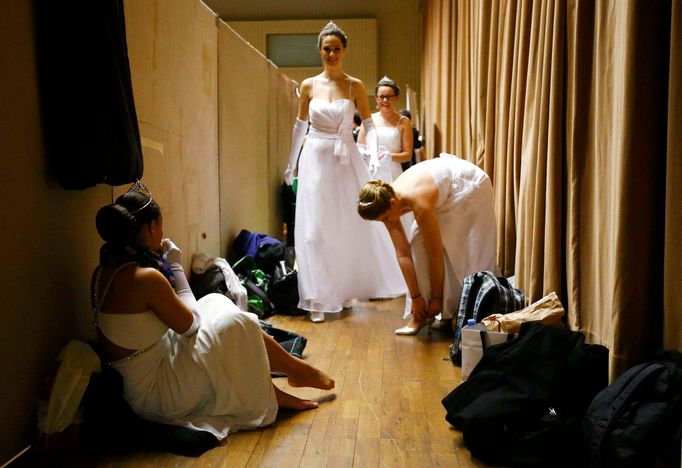 Dancers wait before the opening ceremony of the Opera Ball in Vienna