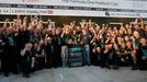 The Mercedes Formula One team pose after winning the 2014 constructors World Championship at the first Russian Grand Prix in Sochi October 12, 2014. REUTERS/Maxim Shemeto