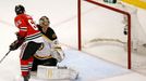 Chicago Blackhawks' Andrew Shaw (65) scores the game-winning goal past Boston Bruins goalie Tuukka Rask during triple overtime in Game 1 of their NHL Stanley Cup Finals h