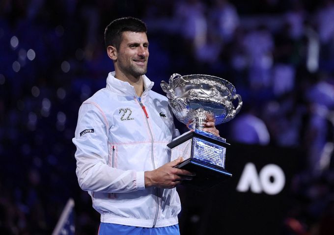 Tennis - Australian Open - Men's Singles Final - Melbourne Park, Melbourne, Australia - January 29, 2023 Serbia's Novak Djokovic celebrates with the trophy after winning