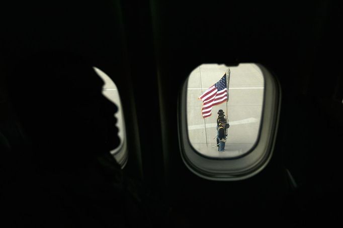 Troops Fly Home From Kuwait To Fort Hood, Texas After U.S. Forces Leave Iraq FORT HOOD, TX - DECEMBER 16: A color guard is seen as U.S. Army soldiers from the 2-82 Field Artillery, 3rd Brigade, 1st Cavalry Division, arrive at their home base of Fort Hood, Texas after being part of one of the last American combat units to exit from Iraq on December 16, 2011 in Fort Hood, Texas. The U.S. military formally ended its mission in Iraq after eight years of war and the overthrow of Saddam Hussein. (Photo by Joe Raedle/Getty Images)