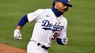 August 17, 2020; Los Angeles, California, USA; Los Angeles Dodgers right fielder Mookie Betts (50) rounds the bases after hitting a solo home run against the Seattle Mari