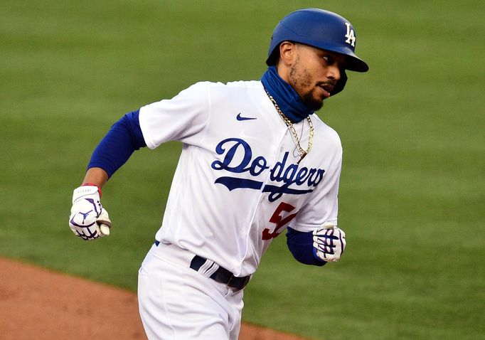 August 17, 2020; Los Angeles, California, USA; Los Angeles Dodgers right fielder Mookie Betts (50) rounds the bases after hitting a solo home run against the Seattle Mari