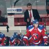 Hokejisté Lva Praha na střídačce v utkání KHL 2012/13 s Dinamem Riga .
