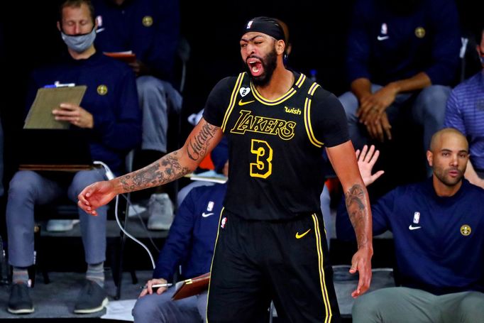 Sep 20, 2020; Lake Buena Vista, Florida, USA; Los Angeles Lakers forward Anthony Davis (3) reacts after making a basket during the fourth quarter against the Denver Nugge