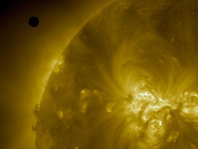 SDO Sees Transit Beginning The Solar Dynamics Observatory (SDO) gets its first glimpse of Venus' approach to the Sun. The image taken by the Atmospheric Imaging Assembly instrument on-board shows the Sun in the 171 wavelength of extreme ultraviolet light. For more Venus Transit images, visit http://www.nasa.gov/mission_pages/sunearth/multimedia/venus-transit-2012.html