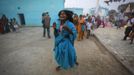 A devotee who is believed to be possessed by evil spirits shouts slogans as she runs in a state of trance around the courtyard of Guru Deoji Maharaj temple during a ghost fair at Malajpur village in Betul district in the central Indian state of Madhya Pradesh January 27, 2013. People from across India come to this fair to be exorcised of �evil spirits�. They are usually brought by relatives and they are most often women. The exorcism involves running around the temple courtyard to make the 'ghost' weak then being beaten by a priest with a broom. Picture taken January 27, 2013. REUTERS/Danish Siddiqui (INDIA - Tags: SOCIETY RELIGION) ATTENTION EDITORS: PICTURE 11 OF 24 FOR PACKAGE 'INDIAN GHOSTBUSTERS' SEARCH 'INDIA GHOST' FOR ALL IMAGES Published: Úno. 5, 2013, 5:09 dop.