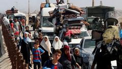 Displaced Palestinians move southward after Israeli forces ordered residents of Gaza City to evacuate to the south