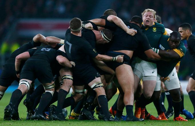 New Zealand players compete in a scrum with South Africa players during their Rugby World Cup Semi-Final match at Twickenham in London, Britain, October 24, 2015. REUTERS