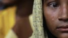 RNPS IMAGES OF THE YEAR 2012 - A Muslim woman, displaced by recent violence in Kyukphyu township, cries after arriving at the Thaechaung refugee camp outside of Sittwe October 28, 2012. REUTERS/Soe Zeya Tun (MYANMAR - Tags: POLITICS CIVIL UNREST SOCIETY TPX IMAGES OF THE DAY) Published: Pro. 3, 2012, 1:08 dop.