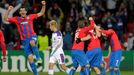 CSKA Moscow's Keisuke Honda walks past Viktoria Plzen's Marian Cisovsky and his teammates celebrating after their Champions League soccer match in Plzen