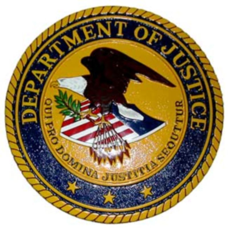 Znak amerického ministerstva spravedlnosti.
