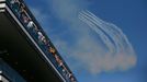 Fans watch an airshow before the first Russian Grand Prix in Sochi October 12, 2014. REUTERS/Maxim Shemetov (RUSSIA - Tags: SPORT MOTORSPORT F1)