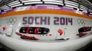 Canada's pilot Chris Spring (front) and his teammates speed down the track during a four-man bobsleigh training session at the Sanki Sliding Center in Rosa Khutor, during