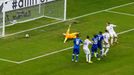 England's goalkeeper Joe Hart concedes a goal by Italy's Claudio Marchisio (not pictured) during their 2014 World Cup Group D soccer match at the Amazonia arena in Manaus