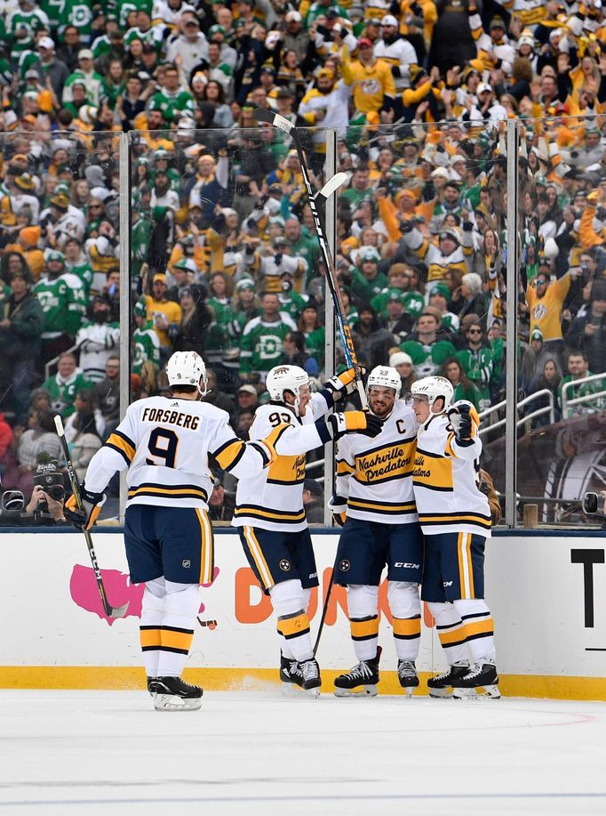 Jan 1, 2020; Dallas, TX, USA; Nashville Predators center Matt Duchene (95) celebrates with teammates after scoring a goal against the Dallas Stars during the first period