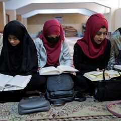 Afghan women learn how to read the Koran at Zainabia madrassa in Kabul
