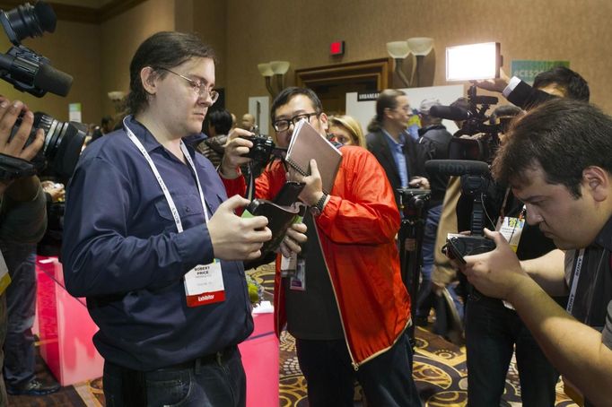 Robert Price demonstrates a TREWGrip keyboard is shown during &quot;CES Unveiled,&quot; a media preview event to the annual Consumer Electronics Show (CES), in Las Vegas,